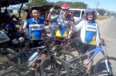 Glencairn MB Church attendees and fellow life group  members Sandra Reimer (r), Trevor Adams, and his daughter Hannah (l) from Kitchener, Ont., embark on a cycling tour of Honduras with Mennonite Central committee. Photo: courtesy Sandra Reimer