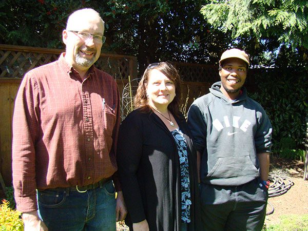 Murray and Cheryl Siemens say that their lives have been enriched by IVEPer Rorisang Moliko who comes from Lesotho and is spending this year learning new farming techniques at Siemens’ Willow View Farms.  MCC Photo: Angelika Dawson