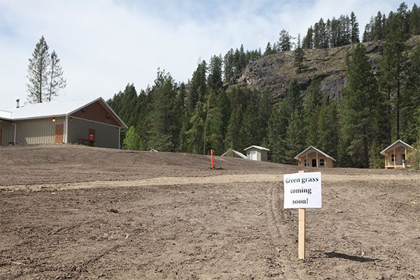 A sign of hope greets visitors as the Pines camping season nears. It doesn’t look like it did before the windstorm, but director Gene Krahn says after all the redesign work, “it really is beautiful.”