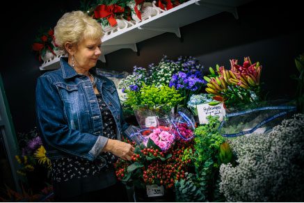 Delores Derksen cares for others by delivering floral arrangements. Photo: Ellaina Brown