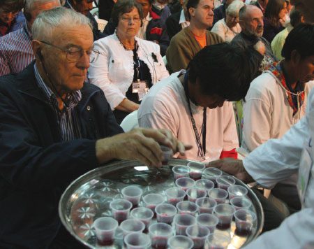 Attendees at Assembly 15 in Paraguay take communion together.  Photo: Lowell Brown