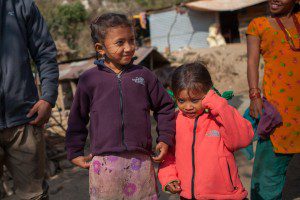  Ashmita Chepang (7), and Ashmika Chepang (4) wearing the jackets they received through MCC partner Sansthagat Bikas Sanjal (Sanjal), in December 2015. The jackets were part of a distribution of winter supplies to about 30 households in the village of Bhasbhase, Nepal, where many homes were destroyed in the April 25th earthquake. Sanjal is an MCC partner in Nepal that operates through a network of local community based organizations. MCC has worked alongside Sanjal in the districts of Surkhet, Dhading, Okhaldunga and Banke districts on a variety of projects, such as HIV/AIDS prevention, food security, rural education, peacebuilding and disaster response.